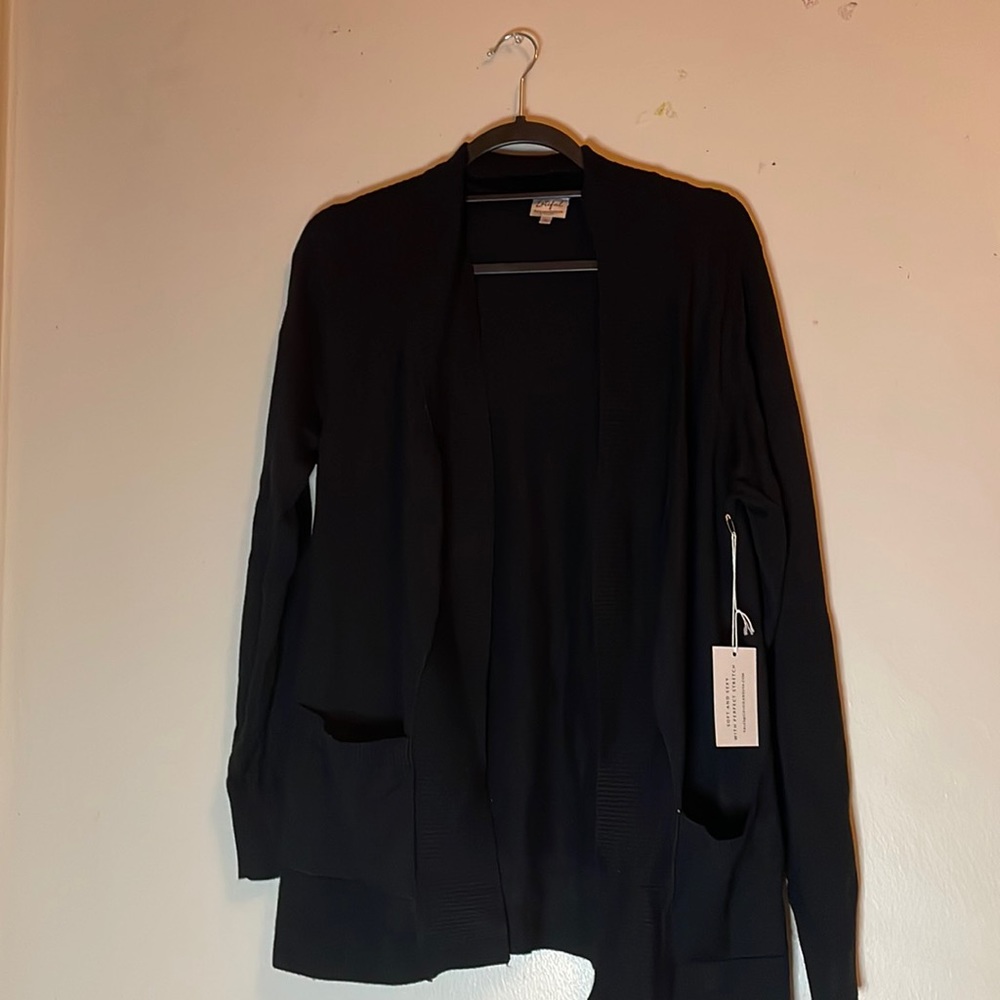 Never worn! Too big for me